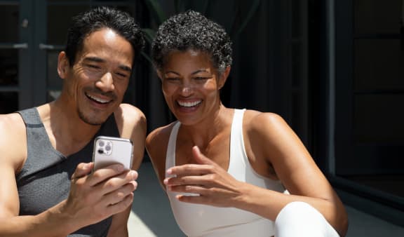 couple-looking-at-phone