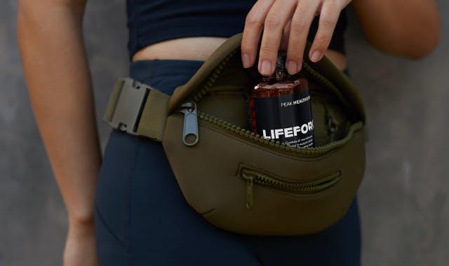 lady-with-LF-bottle-in-fanny-pack
